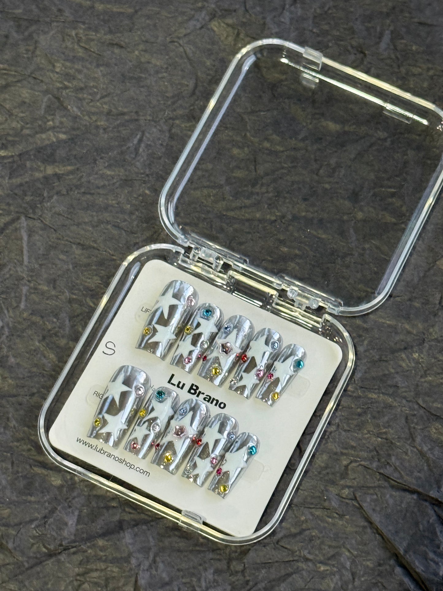 Sleek Silver Star Nails