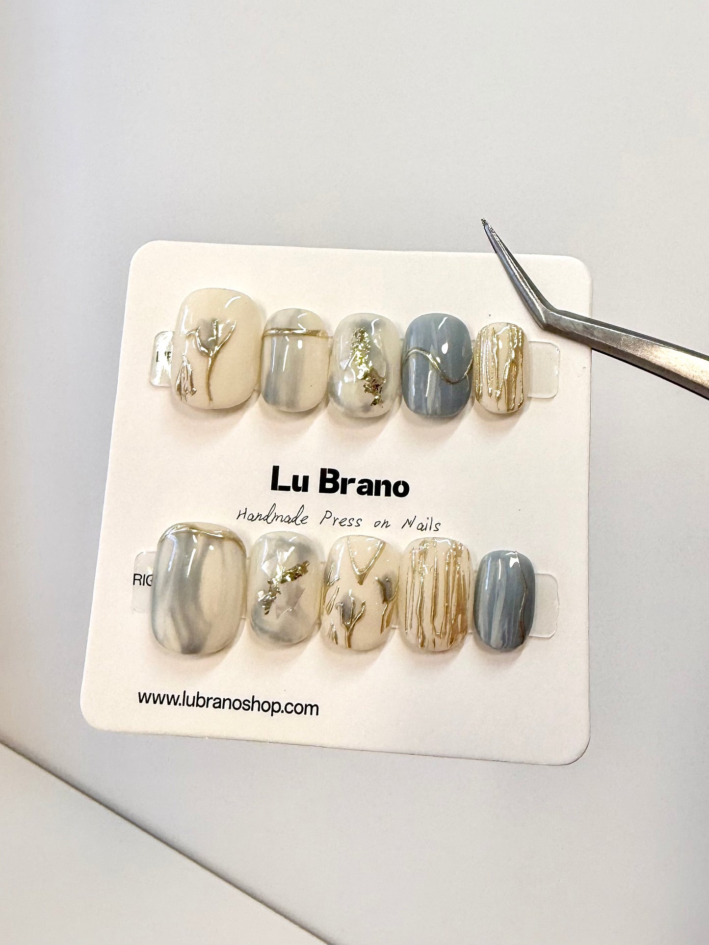 Azure Bloom | Hand-Painted Designs | Short Squoval Shape | Baby Blue Hue | Gentle & Niche Style | Work-Friendly | Versatile & Cute | Autumn/Winter Edition | Metallic Gold Accents | Chinese & Japanese Aesthetics | Premium Press-On Nails | Handmade Craft