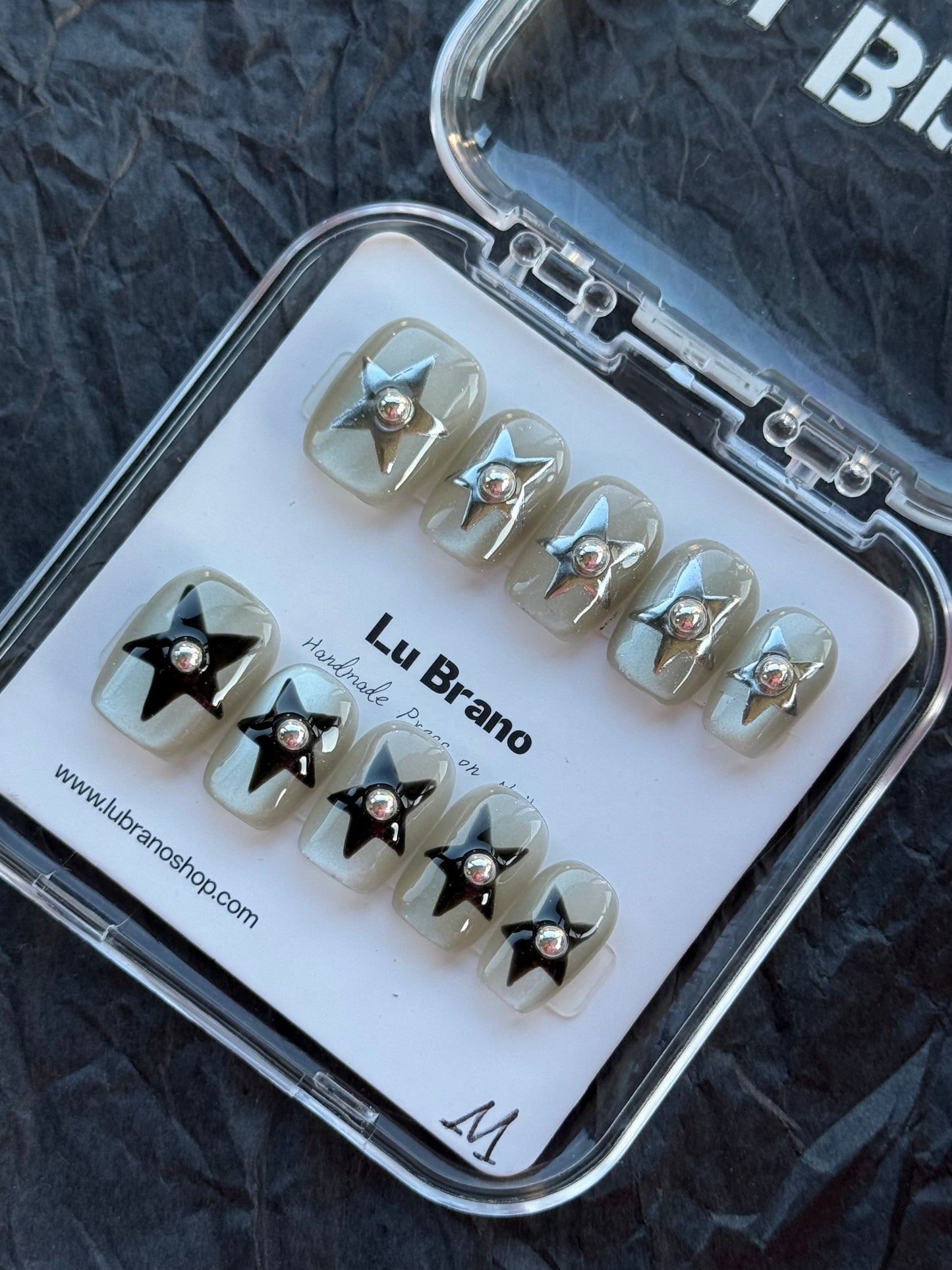 Cat-eye with black and silver stars