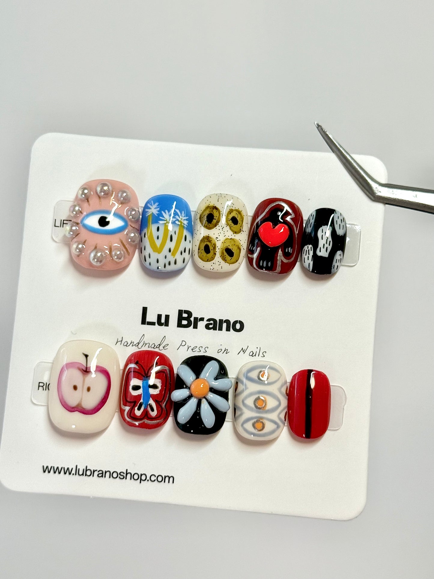 Abstract Muse | Hand-Painted Designs | Short Squoval Shape | Niche Aesthetic | Work-Friendly | Versatile & Cute | Evil Eye Nails | Heart & Apple Motifs | Butterfly & 3D Florals | Premium Press-On Nails | Handmade Artistry