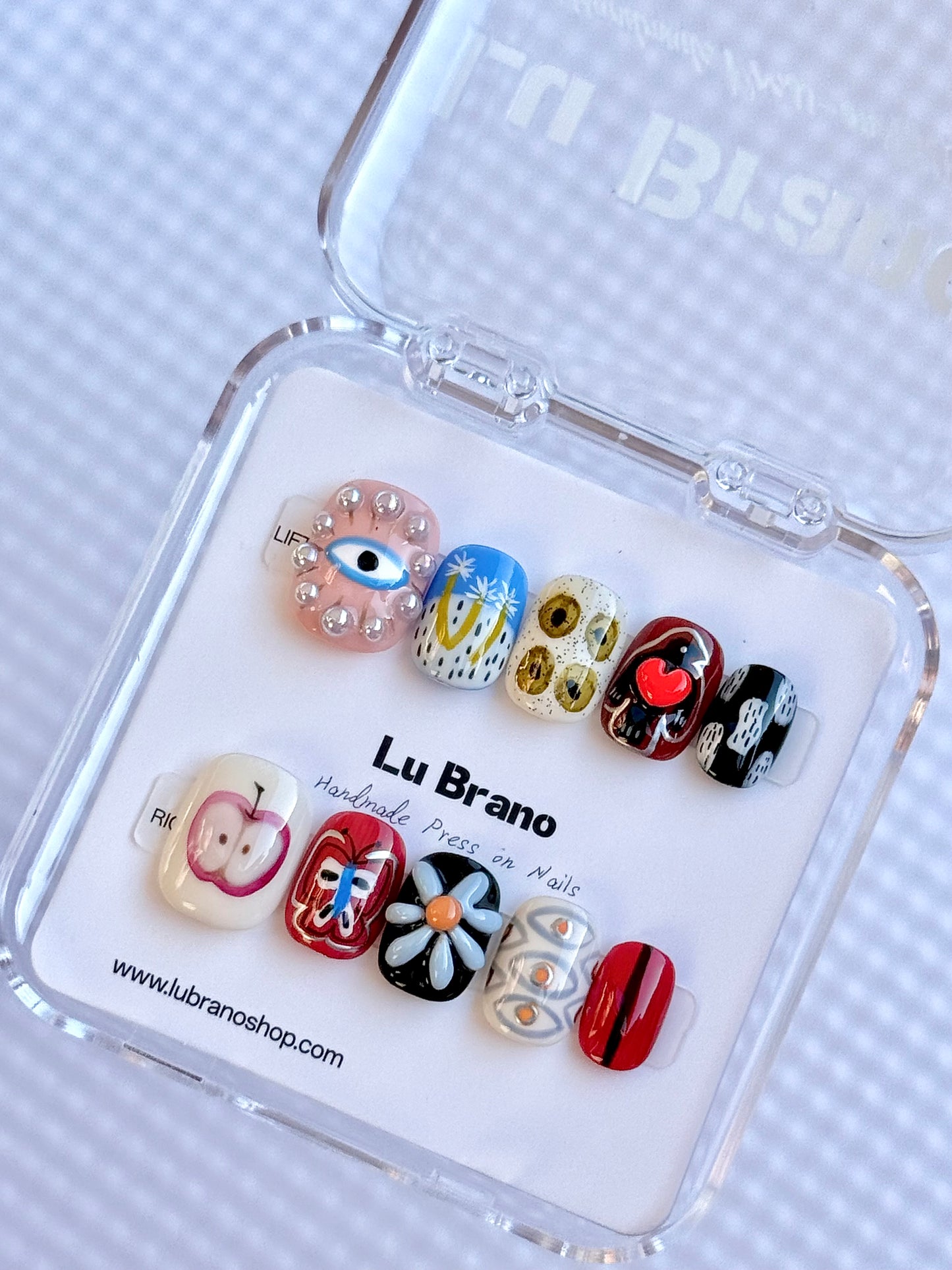 Abstract Muse | Hand-Painted Designs | Short Squoval Shape | Niche Aesthetic | Work-Friendly | Versatile & Cute | Evil Eye Nails | Heart & Apple Motifs | Butterfly & 3D Florals | Premium Press-On Nails | Handmade Artistry
