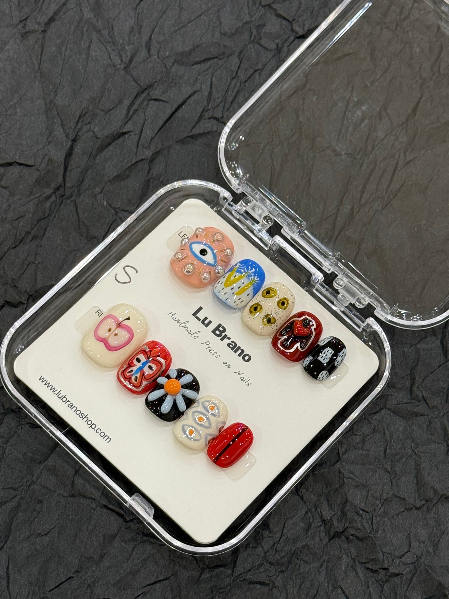 Abstract Muse | Hand-Painted Designs | Short Squoval Shape | Niche Aesthetic | Work-Friendly | Versatile & Cute | Evil Eye Nails | Heart & Apple Motifs | Butterfly & 3D Florals | Premium Press-On Nails | Handmade Artistry