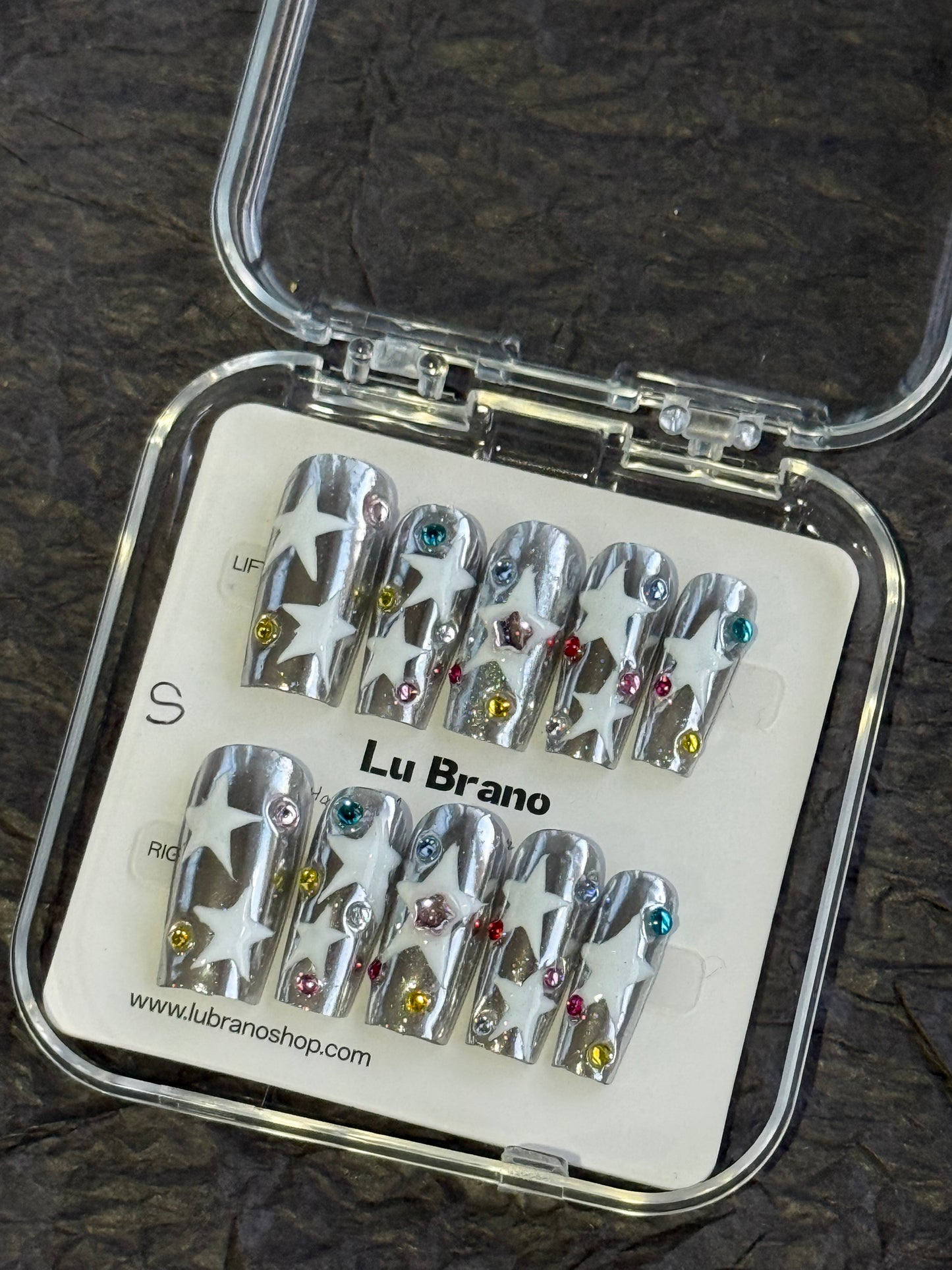 Sleek Silver Star Nails